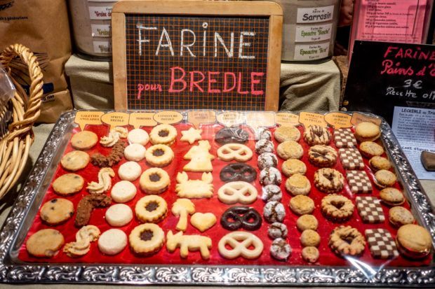 Varieties of bredele, traditional Christmas cookies for sale at an Alsace Christmas market