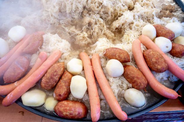 Choucroute garnie is a traditional Strasbourg Christmas market food that is warm and very filling