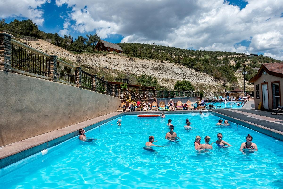 Families in the Iron Mountains hot springs pool.