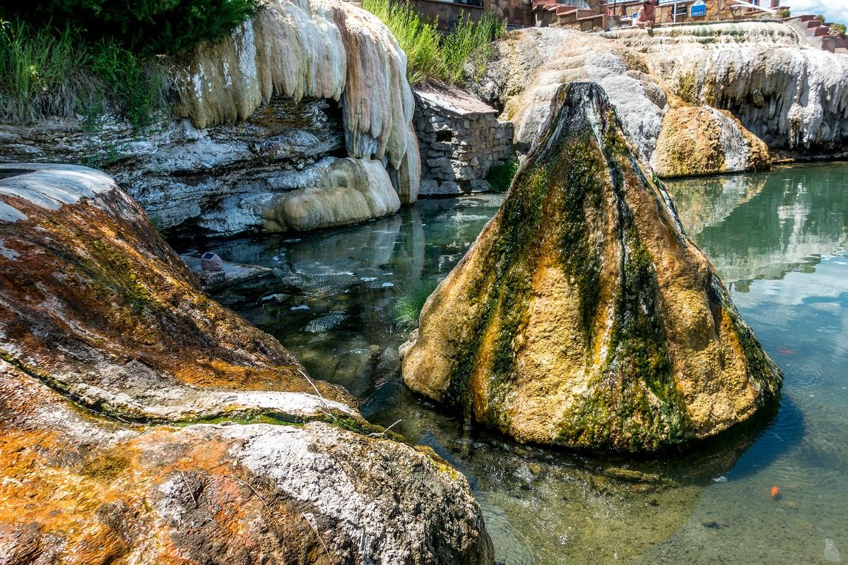 Hot springs have high mineral content, including calcium and sulfur.