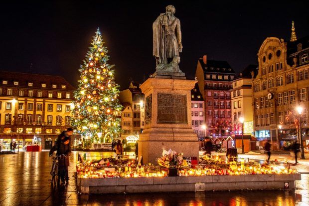 A memorial in Place Kleber honors those who were wounded and killed in an attack at the Strasbourg Christmas market.