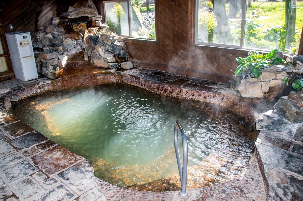 An indoor hot springs soaking pool.