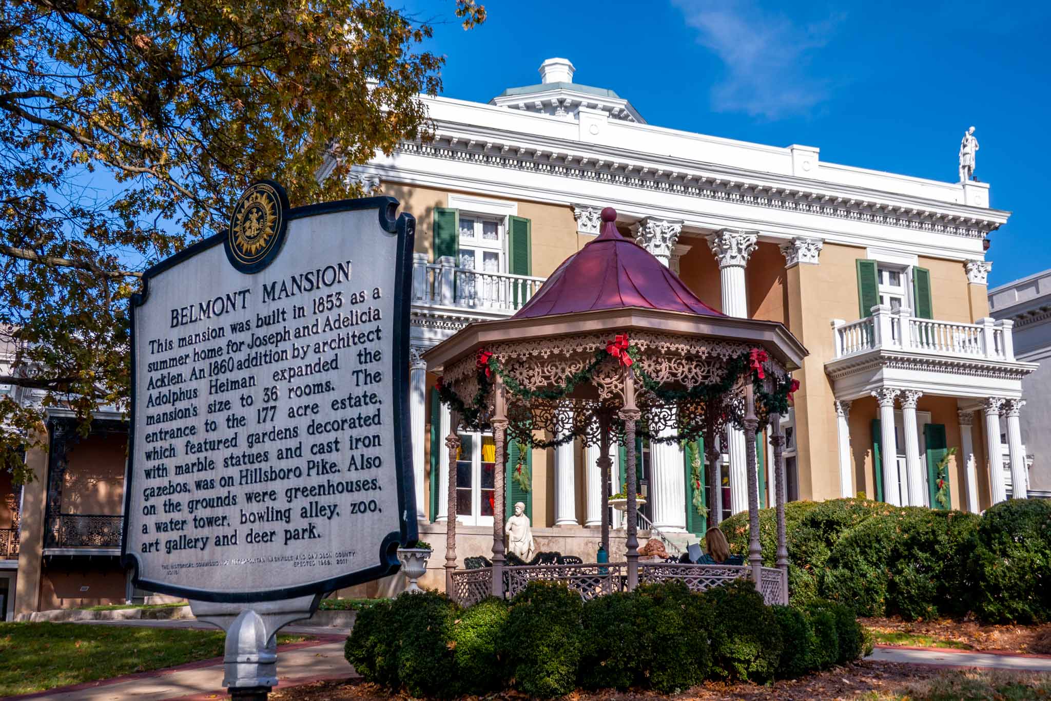 Sign and iron gazeebo in front of Belmont Mansion