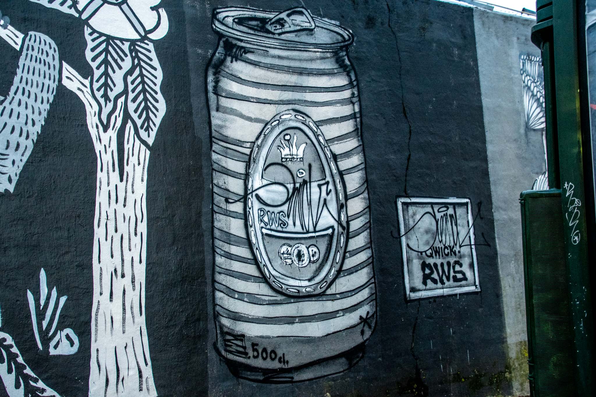 Many street murals are temporary and placed on construction site walls.