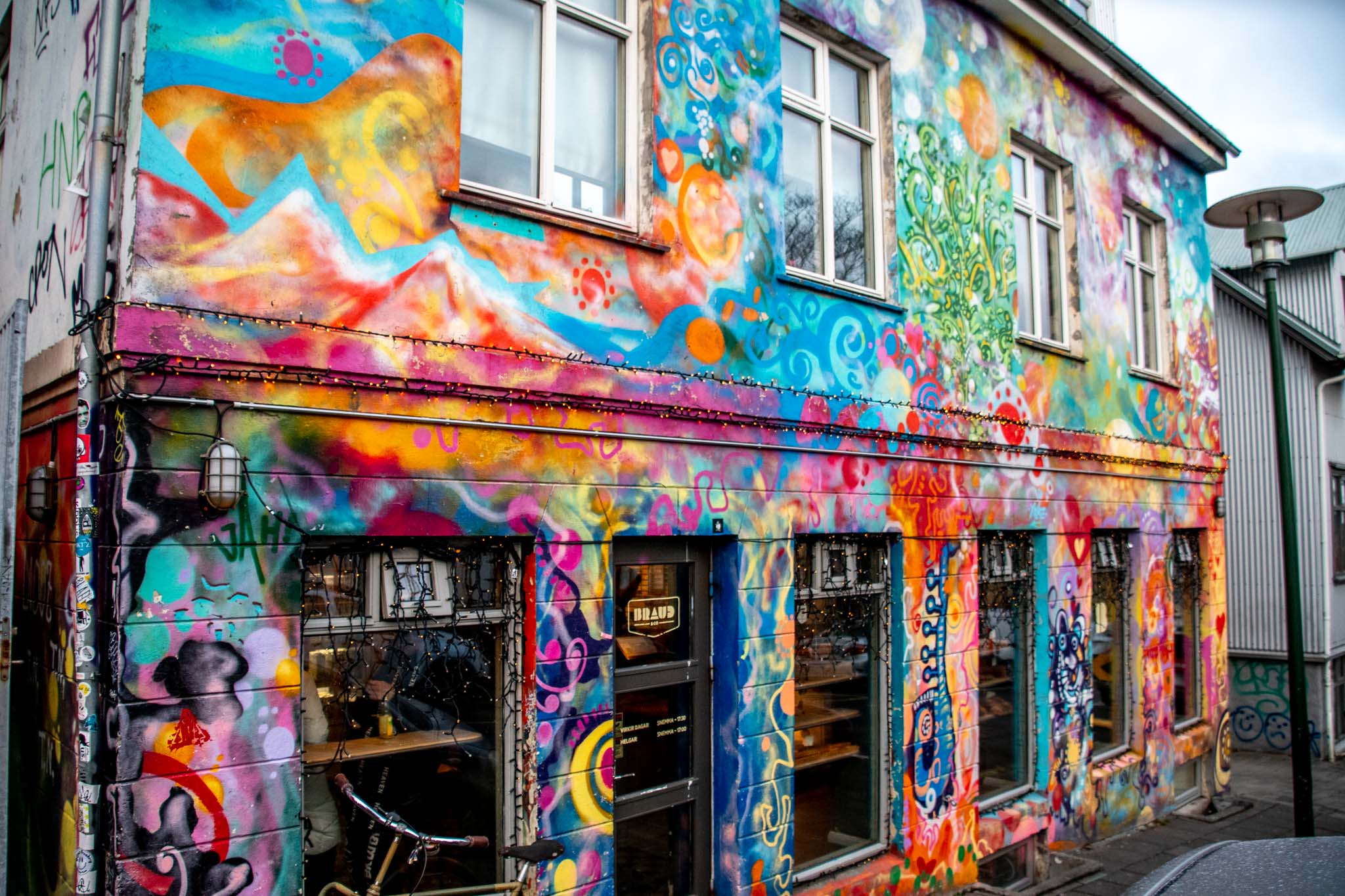 Businesses hire wall muralists to decorate their premises, such as Braud & Co.