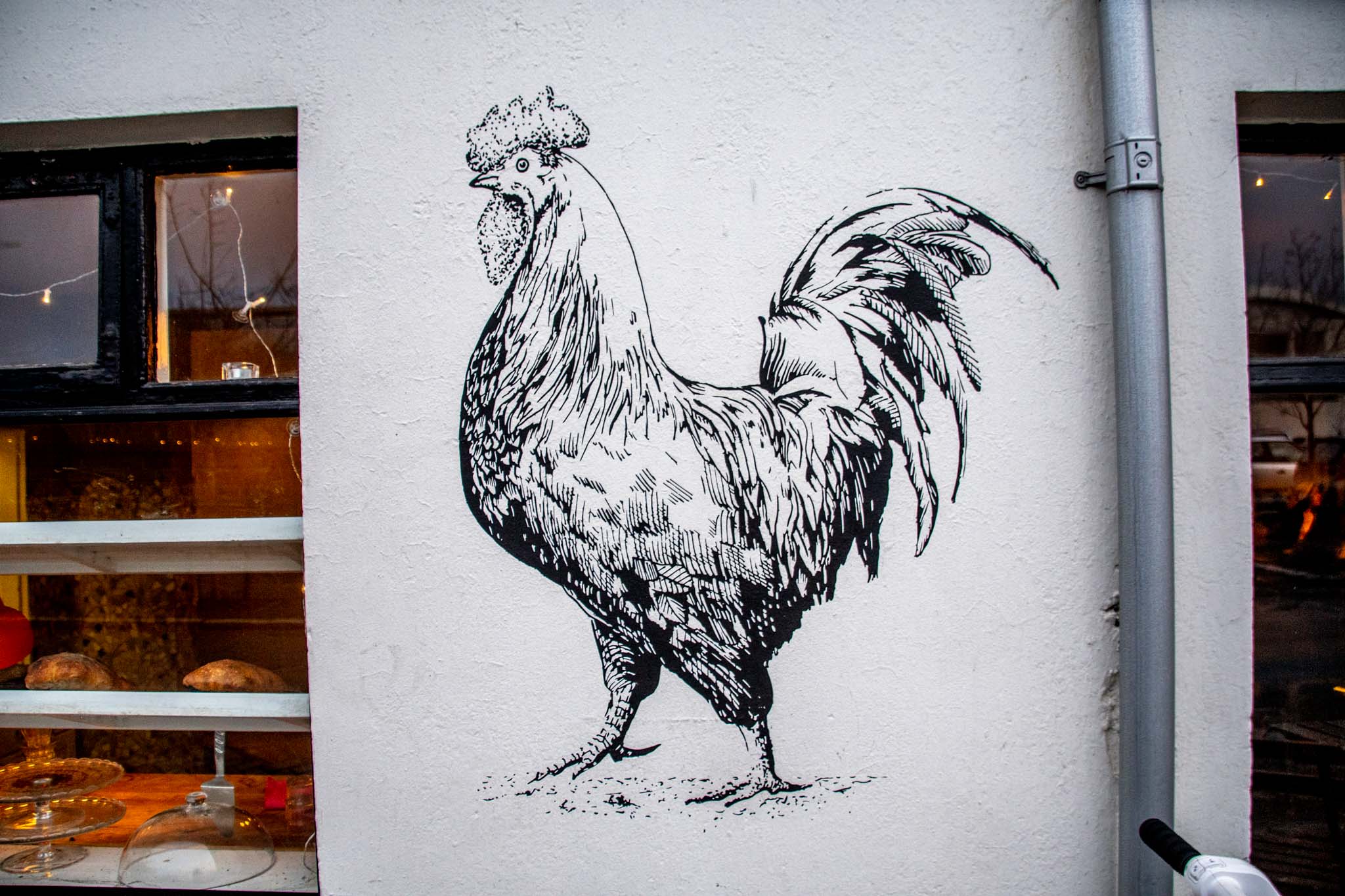 A rooster mural on a Reykjavik street.