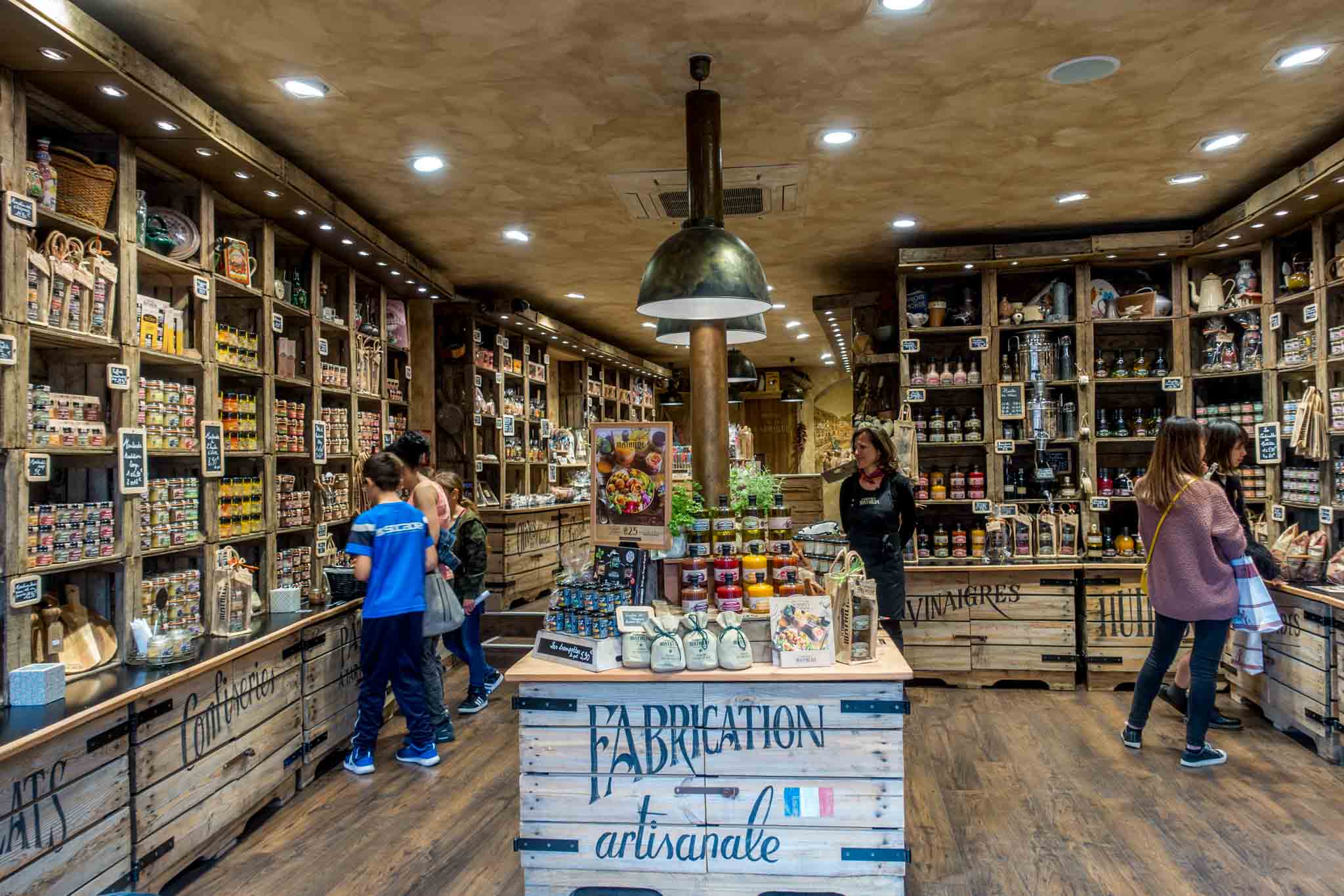 People shopping in a gourmet food store