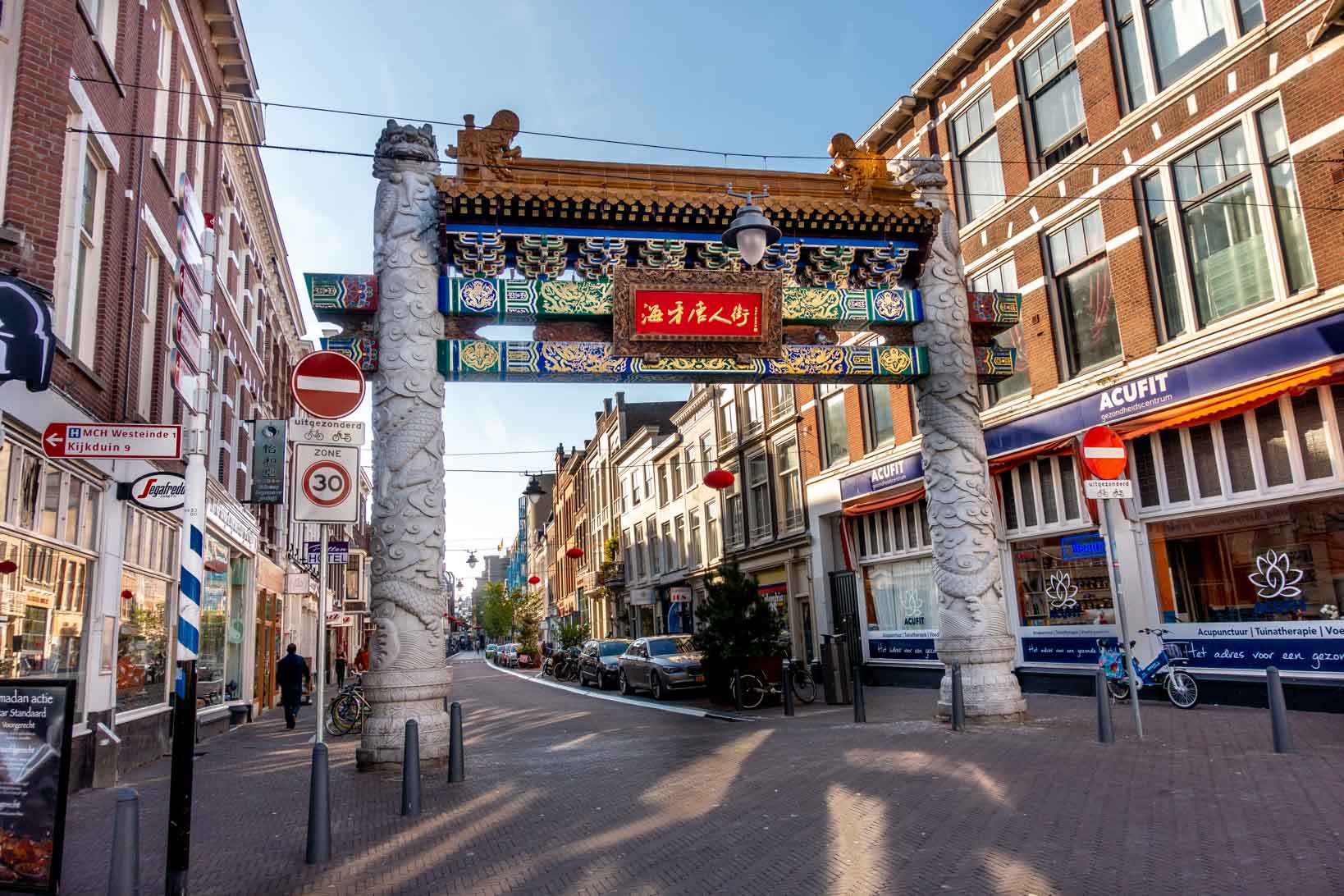 Gate with Chinese characters and decorations at the entrance to Chinatown