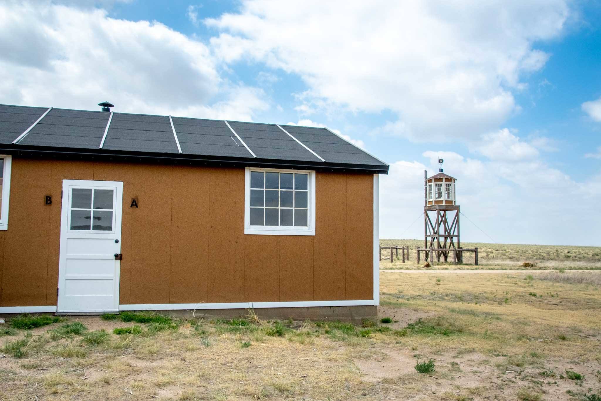 The barracks and guard tower at Camp Amache, the Granada Relocation Center in Colorado