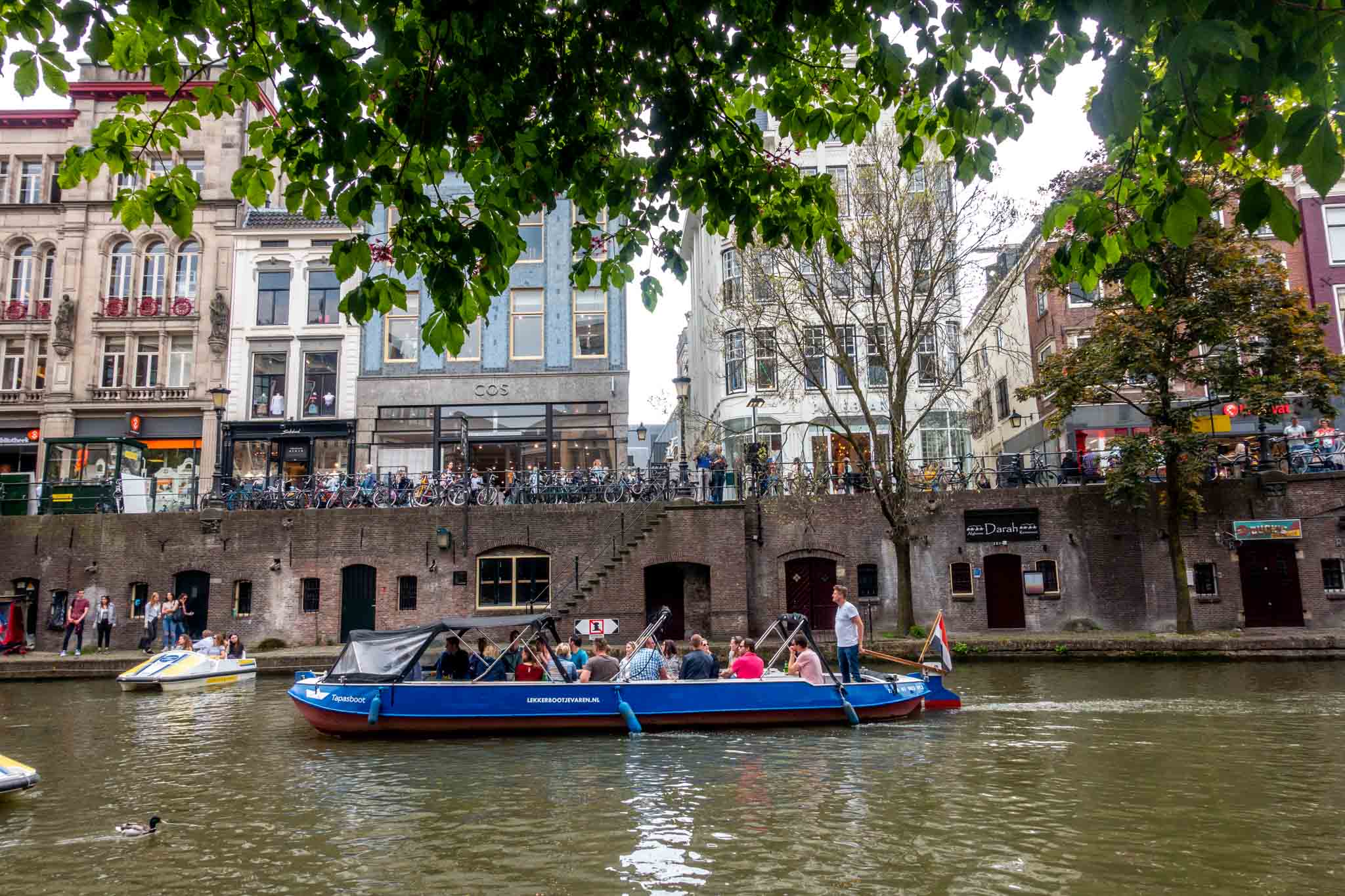 Boats in a canal one level below the street in Utrecht
